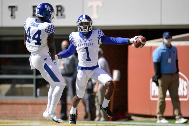 Sophomore cornerback Kelvin Joseph reacted to Jamin Davis after returning an interception for a touchdown in Kentucky's win over Tennessee.