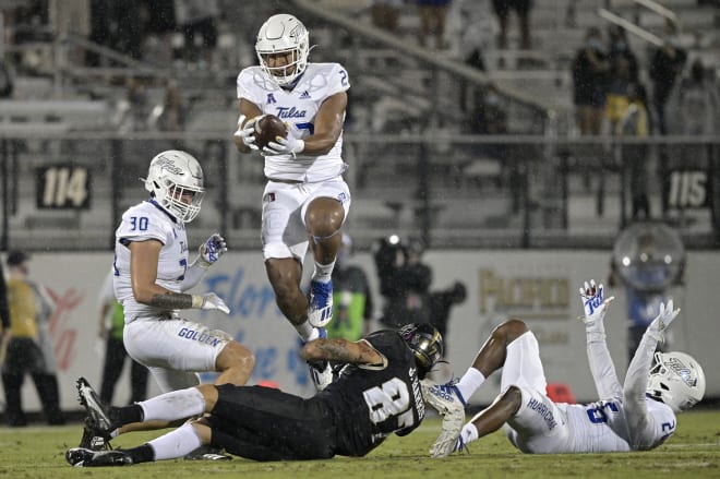 Tulsa LB Zaven Collins intercepts a pass against UCF.