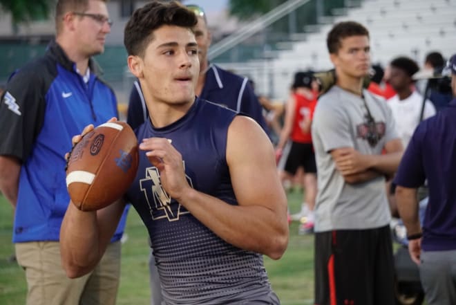 Desert Vista quarterback Parker Navarro spots his receiver during the showcase event at DVHS last Wednesday.  In addition to the Thunder, Salpointe, Chaparral, and Desert Ridge held practices with many college coaches in attendance. (Photo by Ralph Amsden)