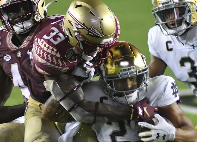 Amari Gainer makes a tackle Sunday night for Florida State against Notre Dame.