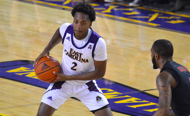 Tristen Newton was the man of the hour with nine of his eleven points in the second half including three treys and the game winner in ECU's 71-68 victory over SMU Saturday afternoon in Minges Coliseum. 