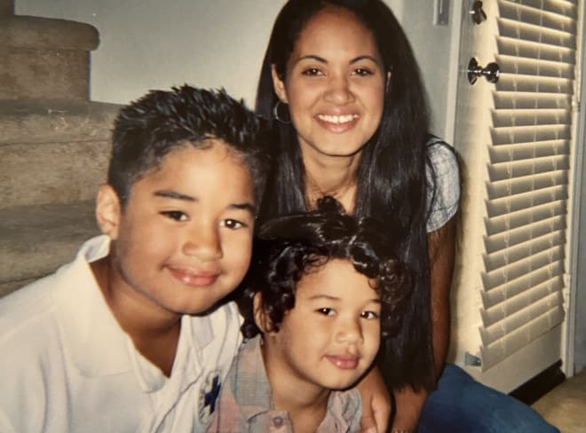 Tausha Uiagalelei is shown here with sons D.J. and Matayo.