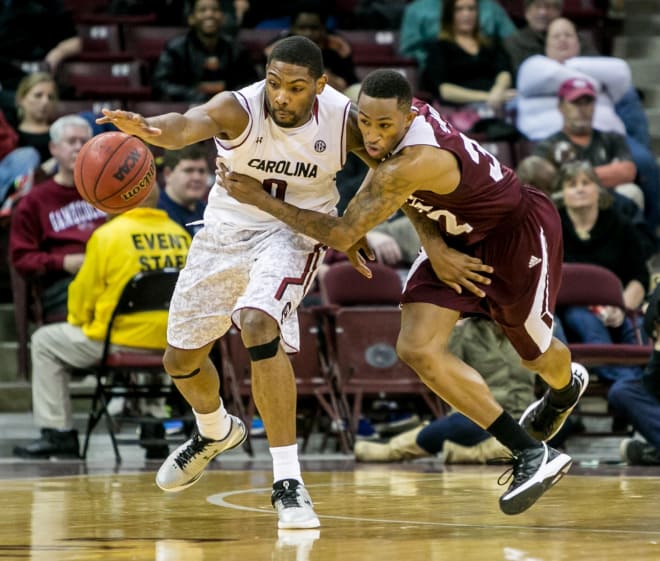 Sindarious Thornwell battles a Miss. State player for the ball in Tuesday's game