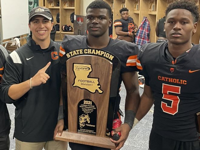Rivals 3-Star RB and Army commit, Corey Singleton (holding state championship trophy)