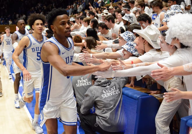 Jeremy Roach celebrates with the Cameron Crazies. 