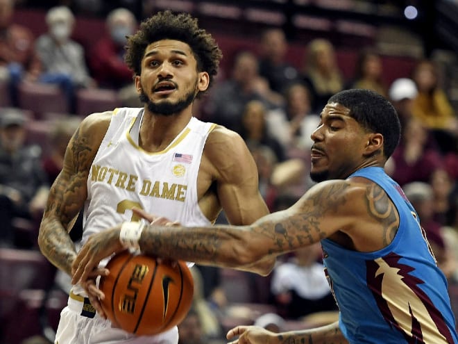  Florida State's RayQuan Evans, right, strips Notre Dame's Prentiss Hubb in a 74-70 FSU victory in Tallahassee, Fla.