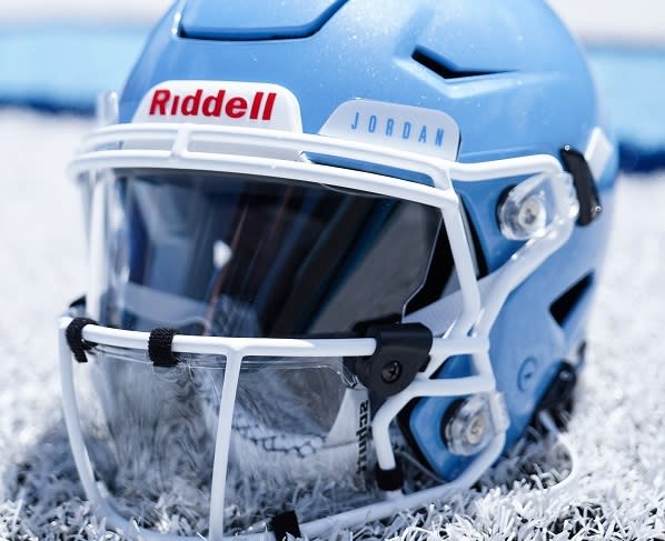UNC's current practice helmet with the full mask shield in place. 