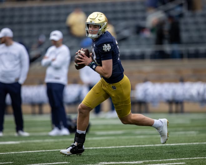 Notre Dame quarterback Riley Leonard (13) hoped to be out of his TayCo ankle brace sometime this month.