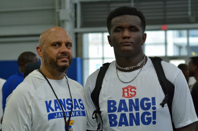 Simpson was key in getting Pruitt and several players from Michigan to the KU camp