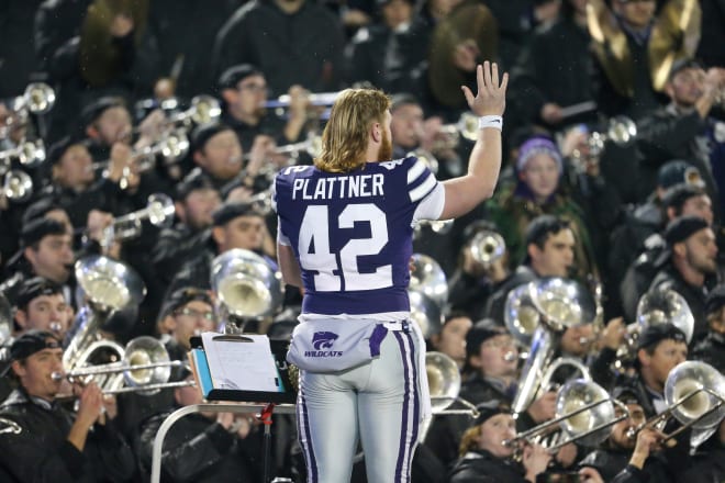 This is the kind of thing that will trigger Alabama fans decades later, and this is the Kansas State long-snapper leading the band after a win over Kansas.