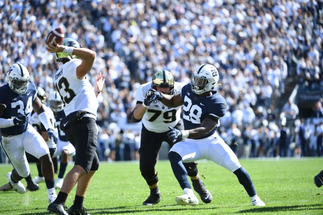 NFL Draft Prospect Jayson Oweh rushes the passer during a game against Purdue 