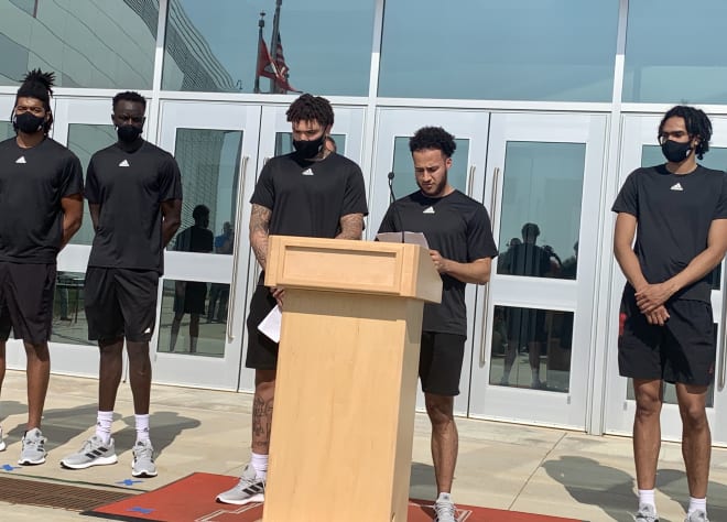 Kobe Webster (right, middle) and Teddy Allen (left, middle) represented Nebraska basketball's stance against social and racial injustices on Thursday.