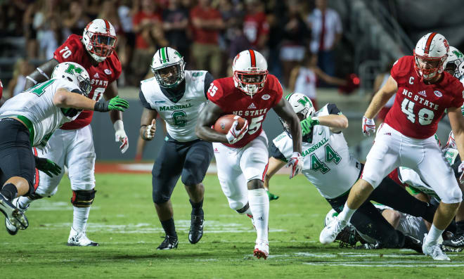 Gallaspy runs through a hole in the middle of the Marshall defense.