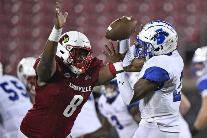 Jarrett Jackson records a sack as a freshman at Louisville two years ago.