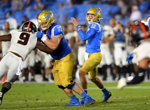 Tom Brady throws passes to other Bruins during a UCLA workout