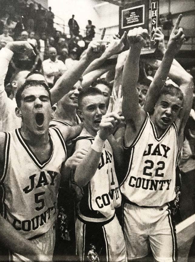 Jay County holding up 1994 Sectional trophy after going 1-19 regular season.