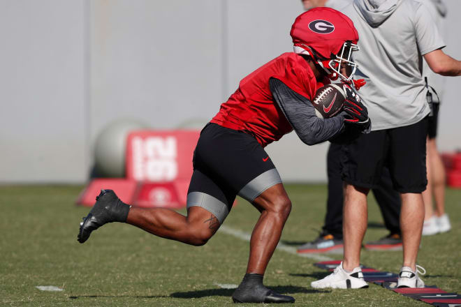 Trevor Etienne goes through practice with the Bulldogs last week.