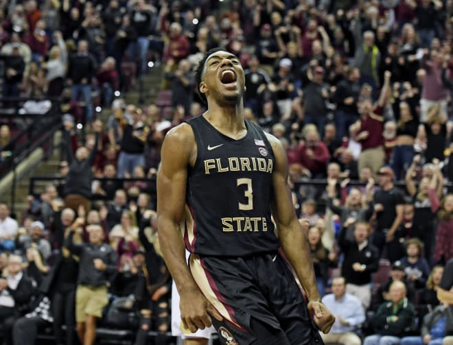Trent Forrest celebrates with FSU fans during the win over Notre Dame.