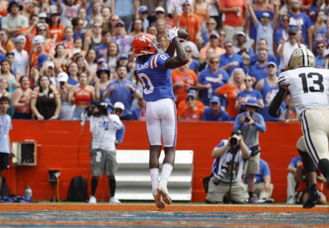Oct 9, 2021; Gainesville, Florida, USA; Florida Gators wide receiver Ja'Quavion Fraziars (0) catches the ball for a touchdown against the Vanderbilt Commodores during the first quarter at Ben Hill Griffin Stadium.