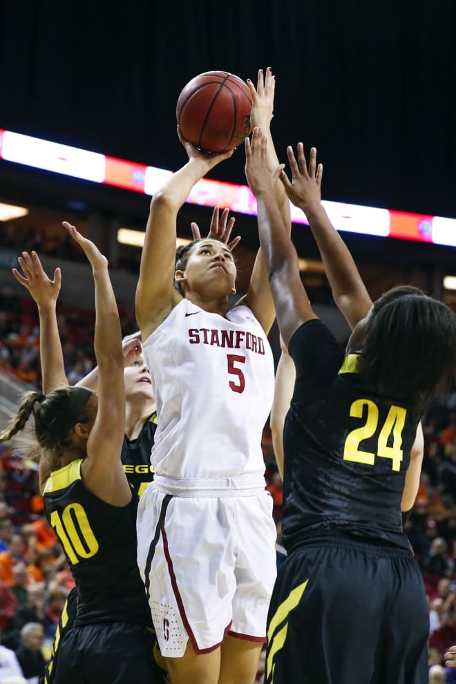 Kaylee Johnson goes up for a shot in the Pac-12 semis against Oregon.
