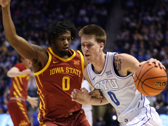 Iowa State's Tre King defends BYU forward Noah Waterman during the Cyclones' loss in Provo.