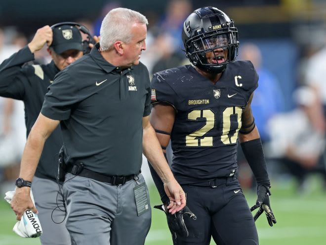 Captain & Safety, Marquel Broughton, who has been Army's most consistent performer this season is escorted off the field after being injured