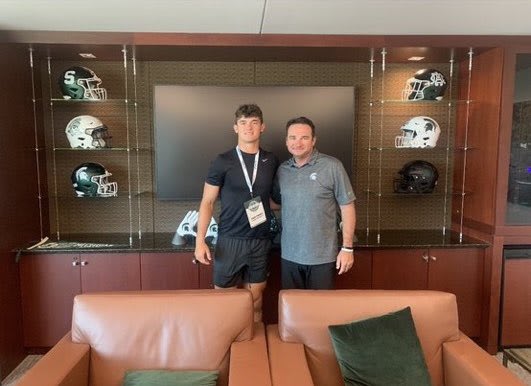 Kaden Gebhardt with Michigan State head coach Jonathan Smith. (Photo courtesy of Kaden Gebhardt)