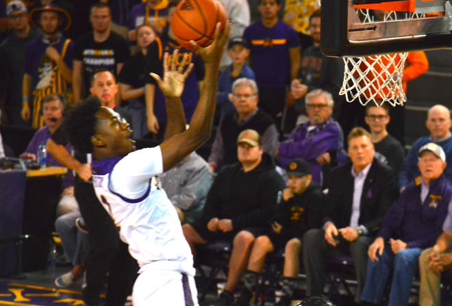 East Carolina's Tristen Newton drives for two in the first half of ECU's 81-62 Saturday night win over Tulane.