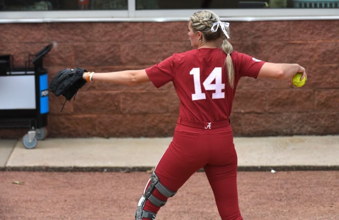 Injured Alabama pitcher Montana Fouts does some light work in the bullpen Sunday during the Tuscaloosa Regional Final doubleheader May 21, 2023, at Rhoads Stadium. Photo | Gary Cosby Jr.-Tuscaloosa News / USA TODAY NETWORK