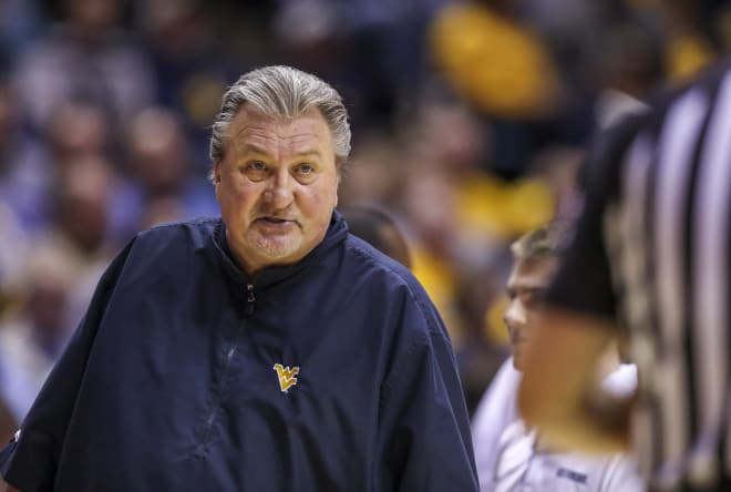 The West Virginia men's basketball team, led by coach Bob Huggins, opened the 2020-21 season with a win on Wednesday.