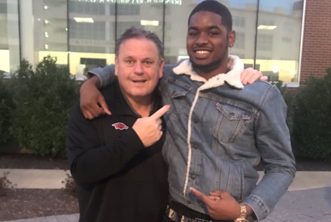 Arkansas head coach Sam Pittman and 2020 signee Darin Turner.