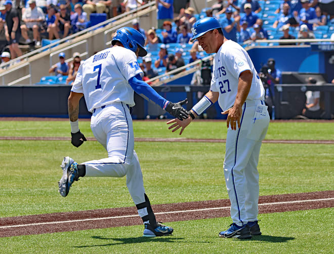Kentucky's Devin Burkes was congratulated by head coach Nick Mingione as he rounded third base after a home run that gave the Wildcats a 1-0 lead in Friday's NCAA Tournament Lexington Regional opener.
