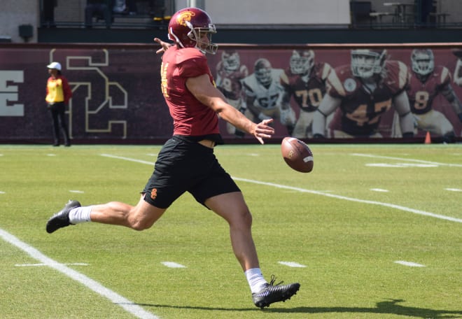 New punter Ben Griffiths, who joined USC after a professional career in the Australian Football League, works in practice Thursday afternoon.