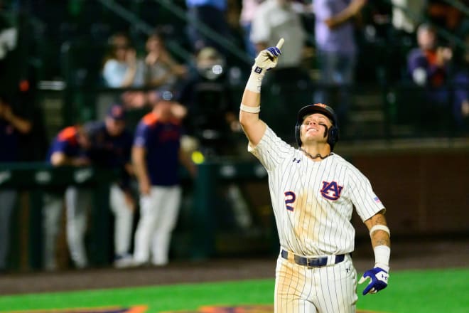 Weiss celebrates one of his two home runs in the win over Georgia Tech.