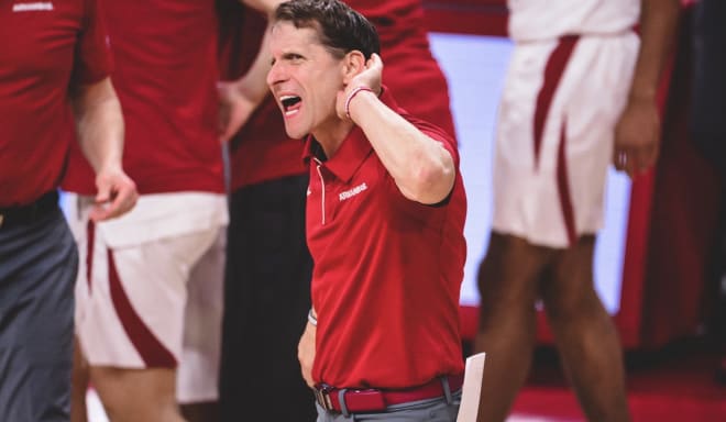 Eric Musselman egging on more noise from the crowd in Bud Walton Arena.
