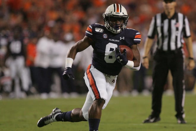 Shaun Shivers (8) carries during Auburn vs. Mississippi State. 