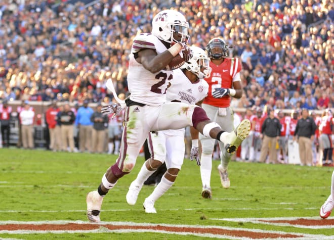 Mississippi State running back Aeris Williams runs for a touchdown in the Bulldogs' 55-20 win over Ole Miss Saturday in Oxford.