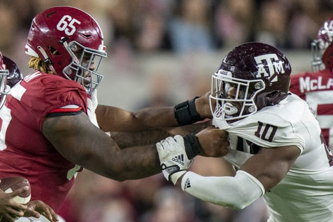 Alabama Crimson Tide offensive lineman JC Latham (65) blocks Texas A&M Aggies defensive lineman Fadil Diggs (10) during the second half at Bryant-Denny Stadium. Photo | Marvin Gentry-USA TODAY Sports