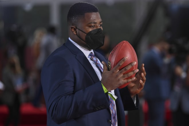 Alabama defensive lineman Christian Barmore holds a football as he appears on the Red Carpet at the Rock & Roll Hall of Fame before the first round of the 2021 NFL football draft, Thursday, April 29, 2021, in Cleveland. Photo | USA Today