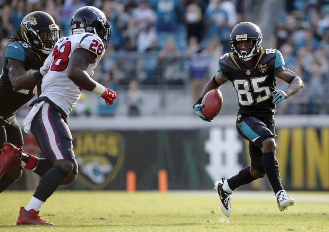 Jacksonville Jaguars wide receiver Jaydon Mickens (85) runs with the ball against the Houston Texans during the second half at EverBank Field. Photo Credit: Kim Klement-USA TODAY Sports