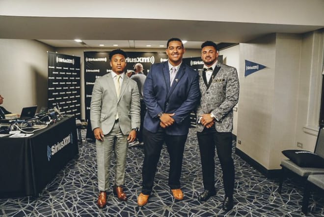 Rondale Moore, Lorenzo Neal and Markus Bailey dressed to impress at Big Ten media days.