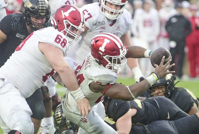 Indiana freshman Sampson James fights his way into the endzone to give the Hoosiers their third score of the game against Purdue on Saturday at Ross-Ade Stadium. (USA Today Images)