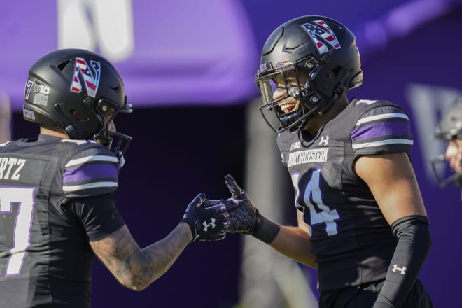 Cam Johnson's 52-yard catch-and-run touchdown was key to Northwestern's 23-15 win over Purdue.