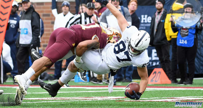 Tight end Pat Freiermuth falls to the ground against Minnesota. 