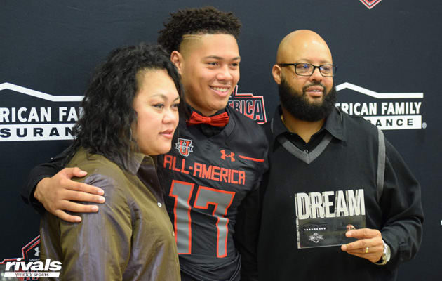 Anthony Hines with his parents at his Under Armour jersey presentation on 11/11/16