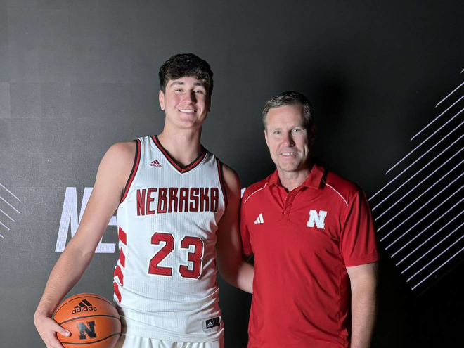 Tommy Ahneman, left, and Nebraska head coach Fred Hoiberg. (Photo courtesy of Tommy Ahneman/X)