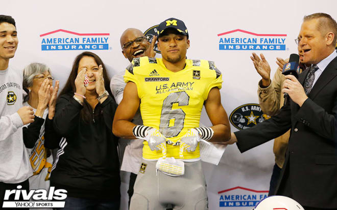 Dylan Crawford slipped on a Michigan hat on Saturday.