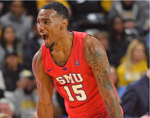 SMU Mustangs forward Isaiah Mike reacts to a play 