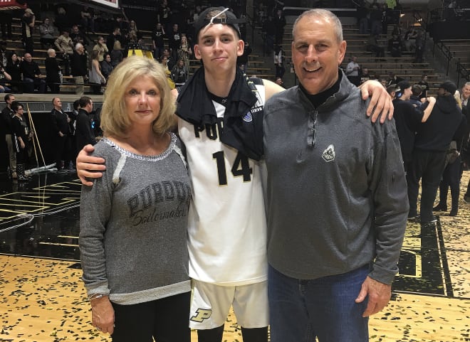 Ryan Cline with his mother, Micki, and father, Mike.