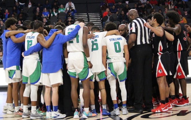 Sportsmanship at its best was on display when both teams - including coaching staffs and officials - gathered at half-court to pray after Elijah Kennedy's devastating injury late in the first quarter